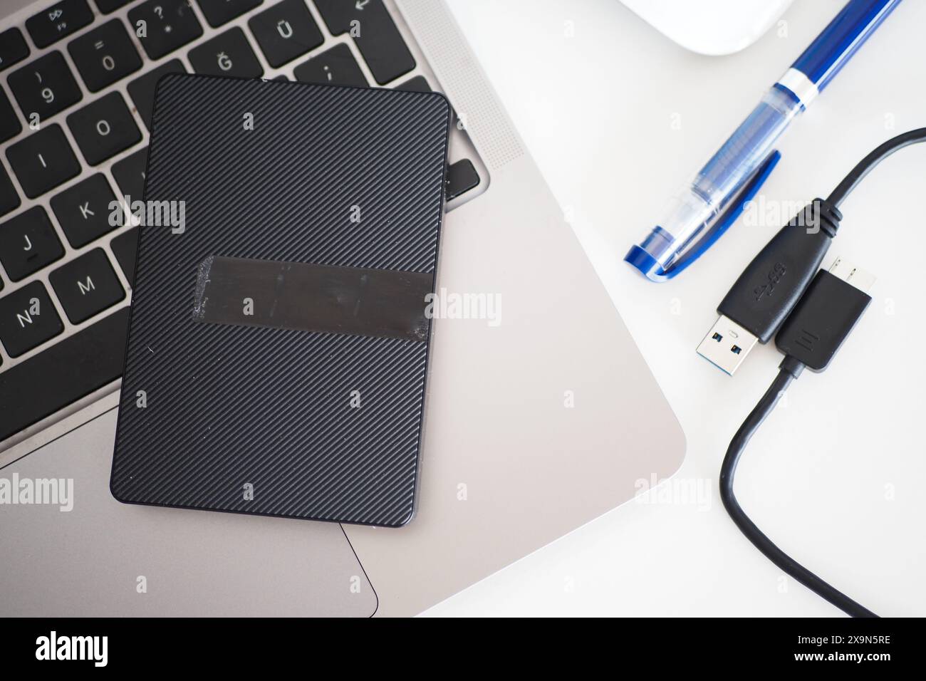 external hard drive on a laptop  Stock Photo