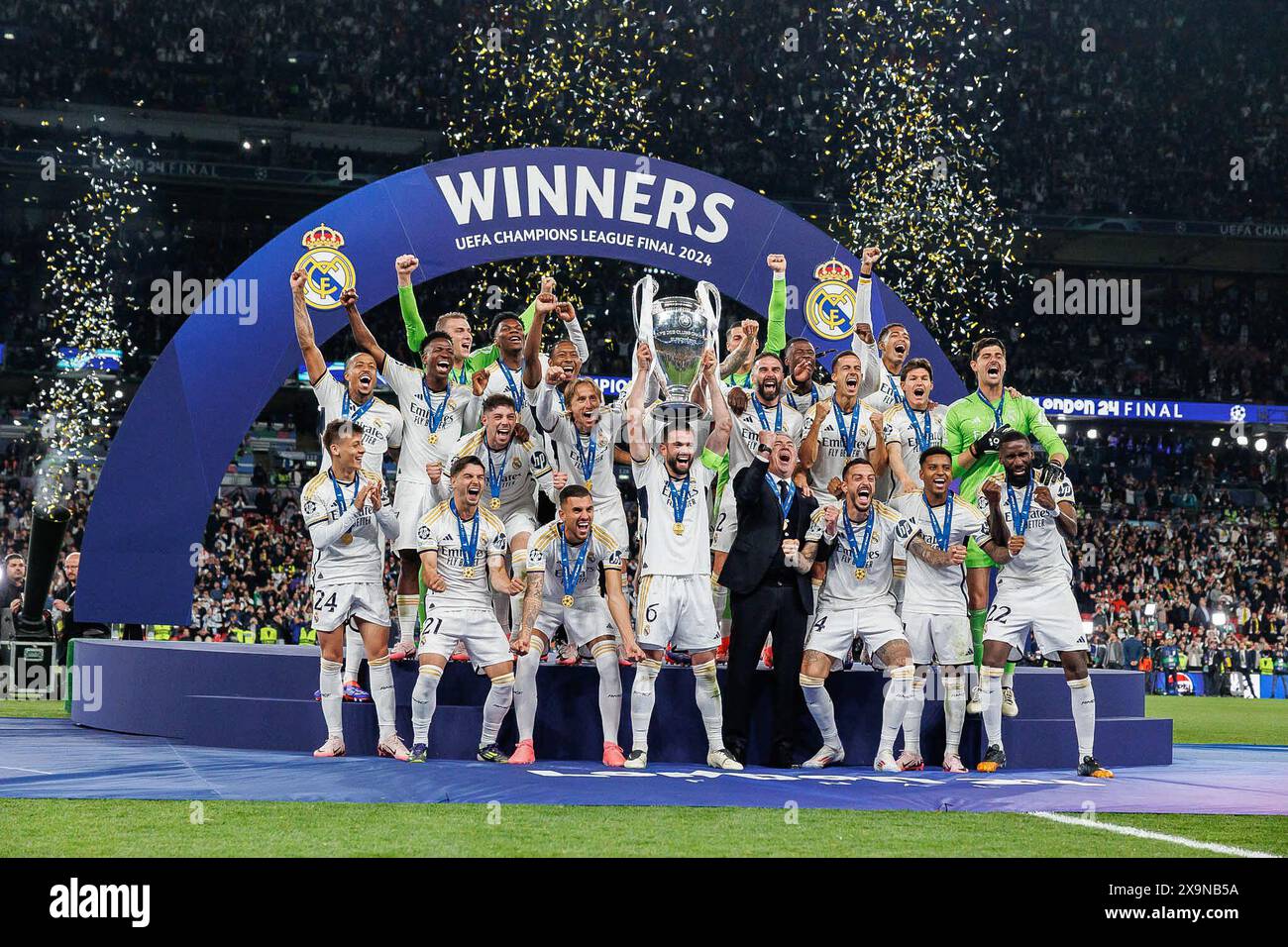 Real madrid celebrate with the trophy hi-res stock photography and ...