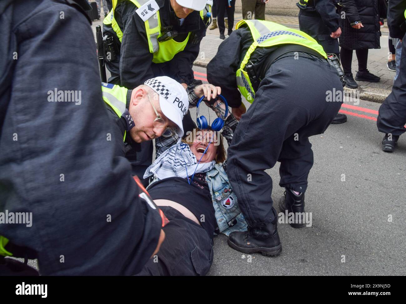 London, UK. 1st June 2024. Police officers arrest a protester blocking York Road near Waterloo Station. Activists from the group Youth Demand marched in solidarity with Palestine as Israel continues its attacks on Gaza. Credit: Vuk Valcic/Alamy Live News Stock Photo