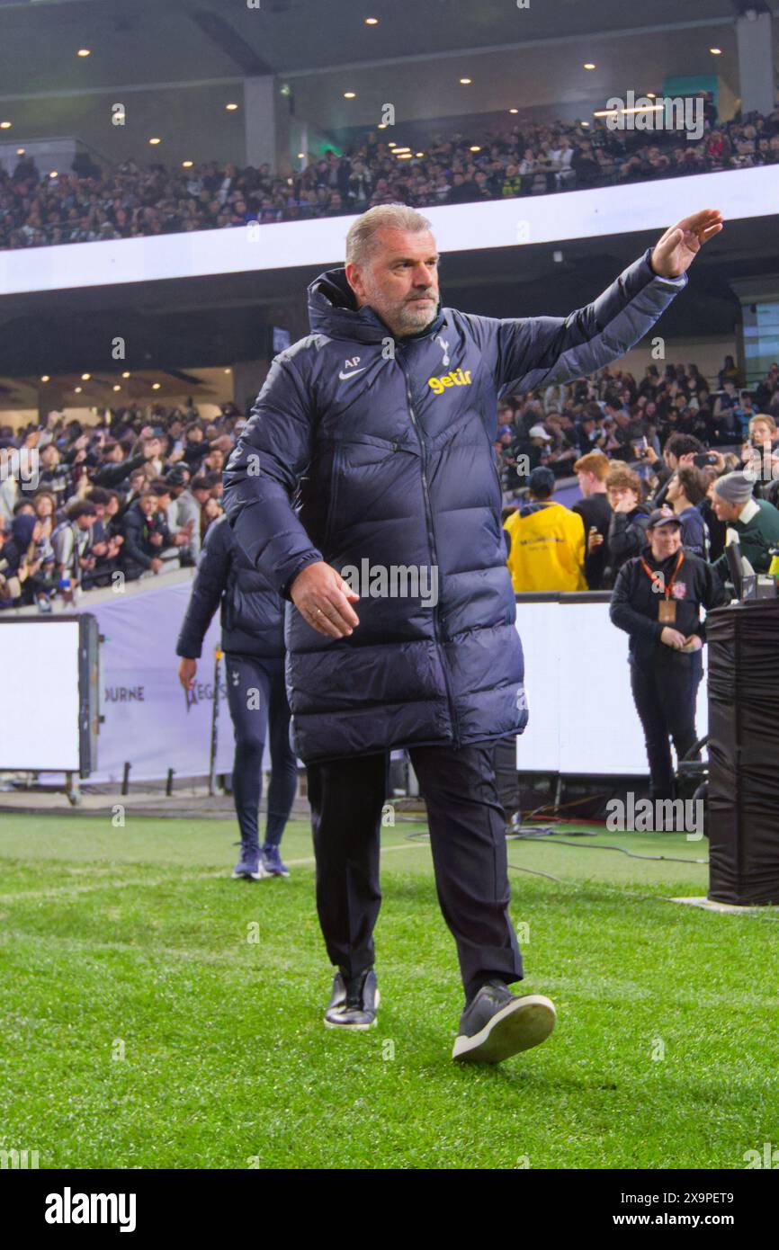 Coach, Ange Postecoglou of Tottenham walks onto the pitch before the Exhibition match between Tottenham and Newcastle at the MCG on May 22, 2024 in Me Stock Photo