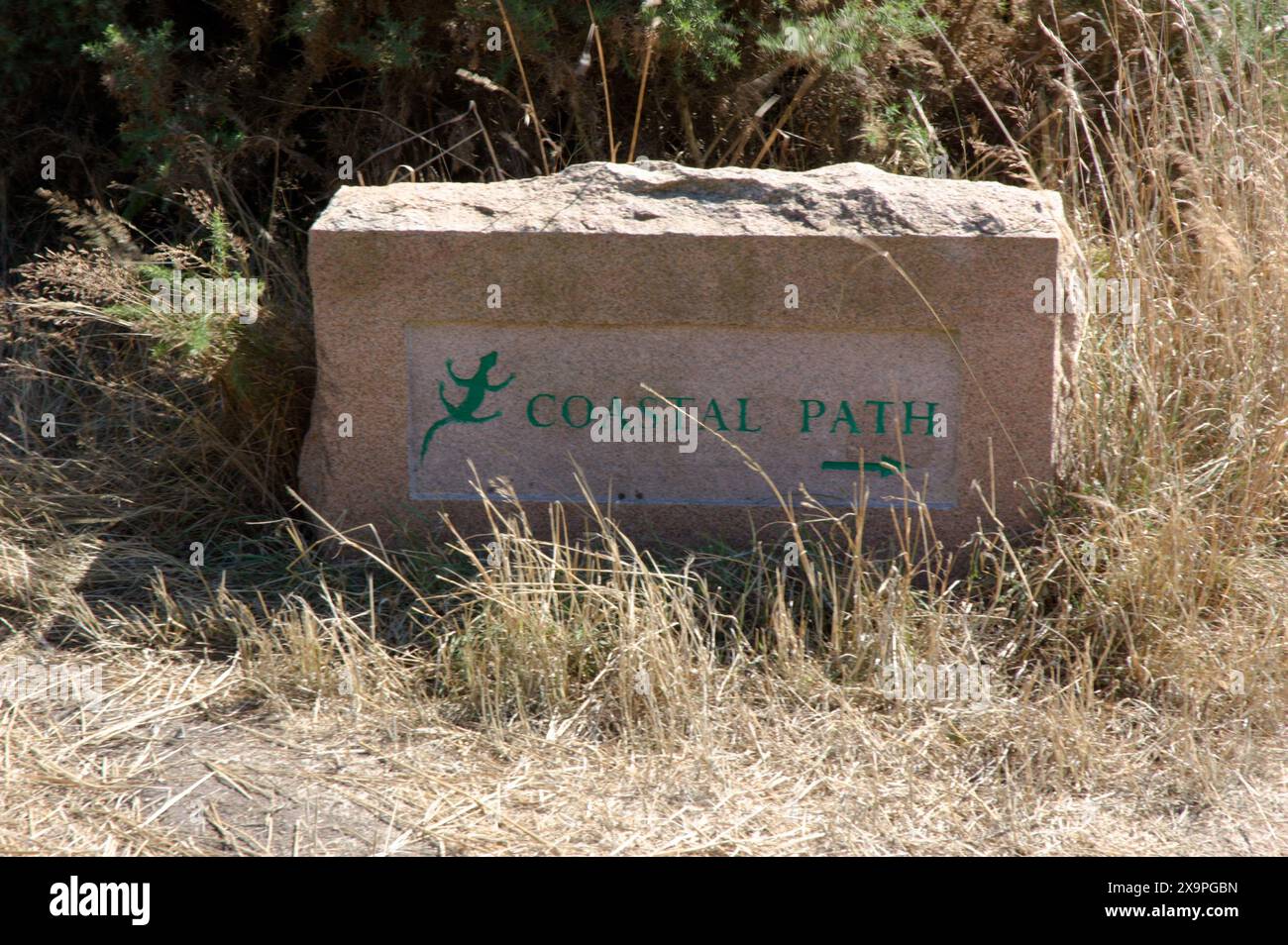 Granite marker on Jersey coastal path, Channel Islands Stock Photo - Alamy