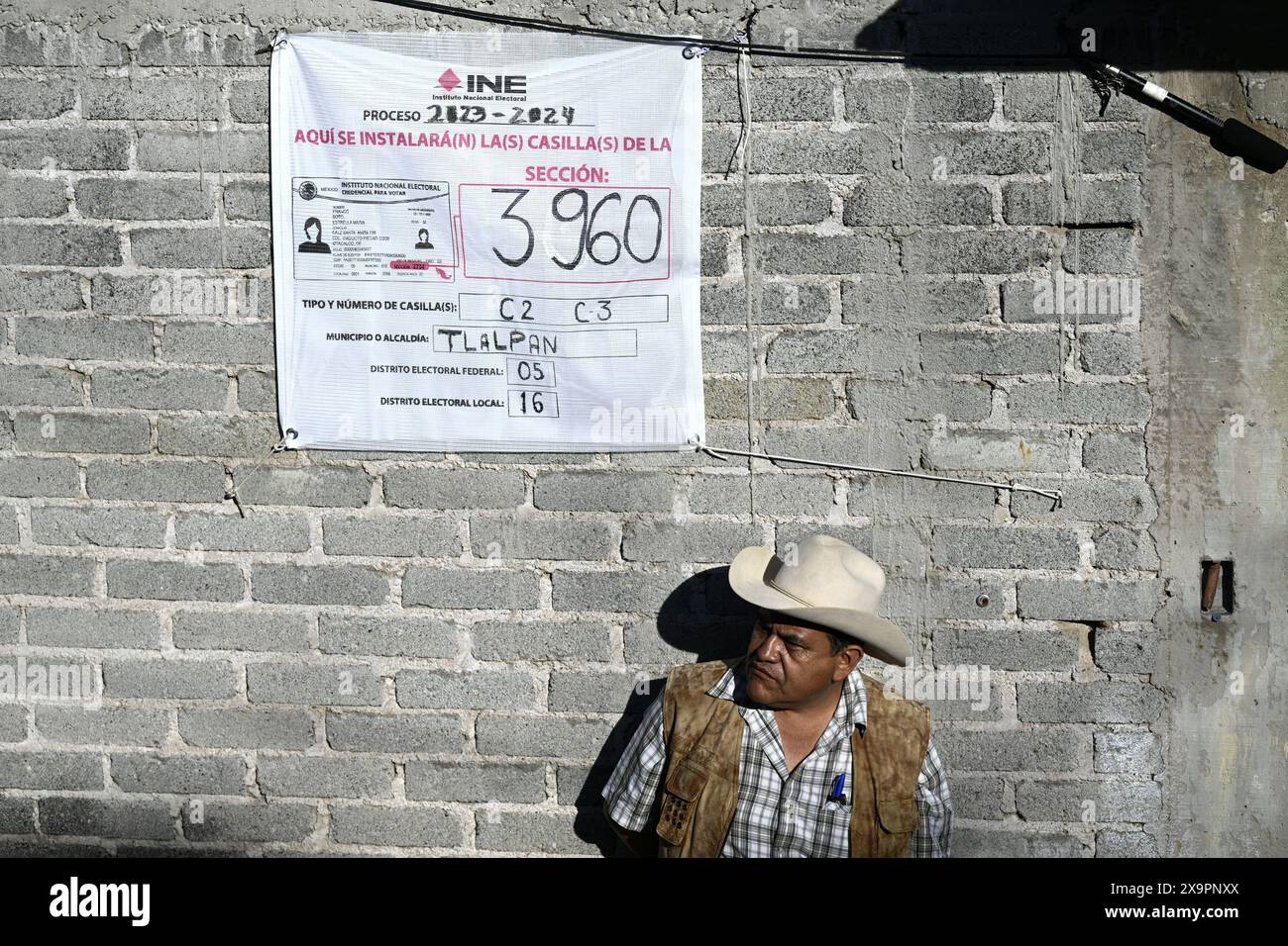 Mexico City, Mexico. 2nd June, 2024. A voter waits to cast his ballot at a polling station in Mexico City, Mexico, June 2, 2024. Sunday's general elections are considered the largest in Mexico's modern history, with the presidency, legislative seats, governorships and local government positions up for grabs. Credit: Li Muzi/Xinhua/Alamy Live News Stock Photo