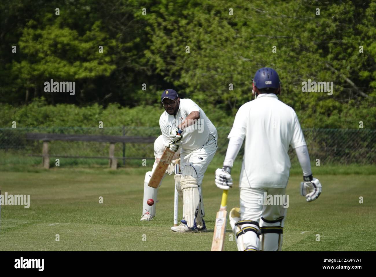 HEADLEY, Surrey, UK - 11th May, 2024  Village cricket on the village green pitch near Headley , Surrey, UK Stock Photo
