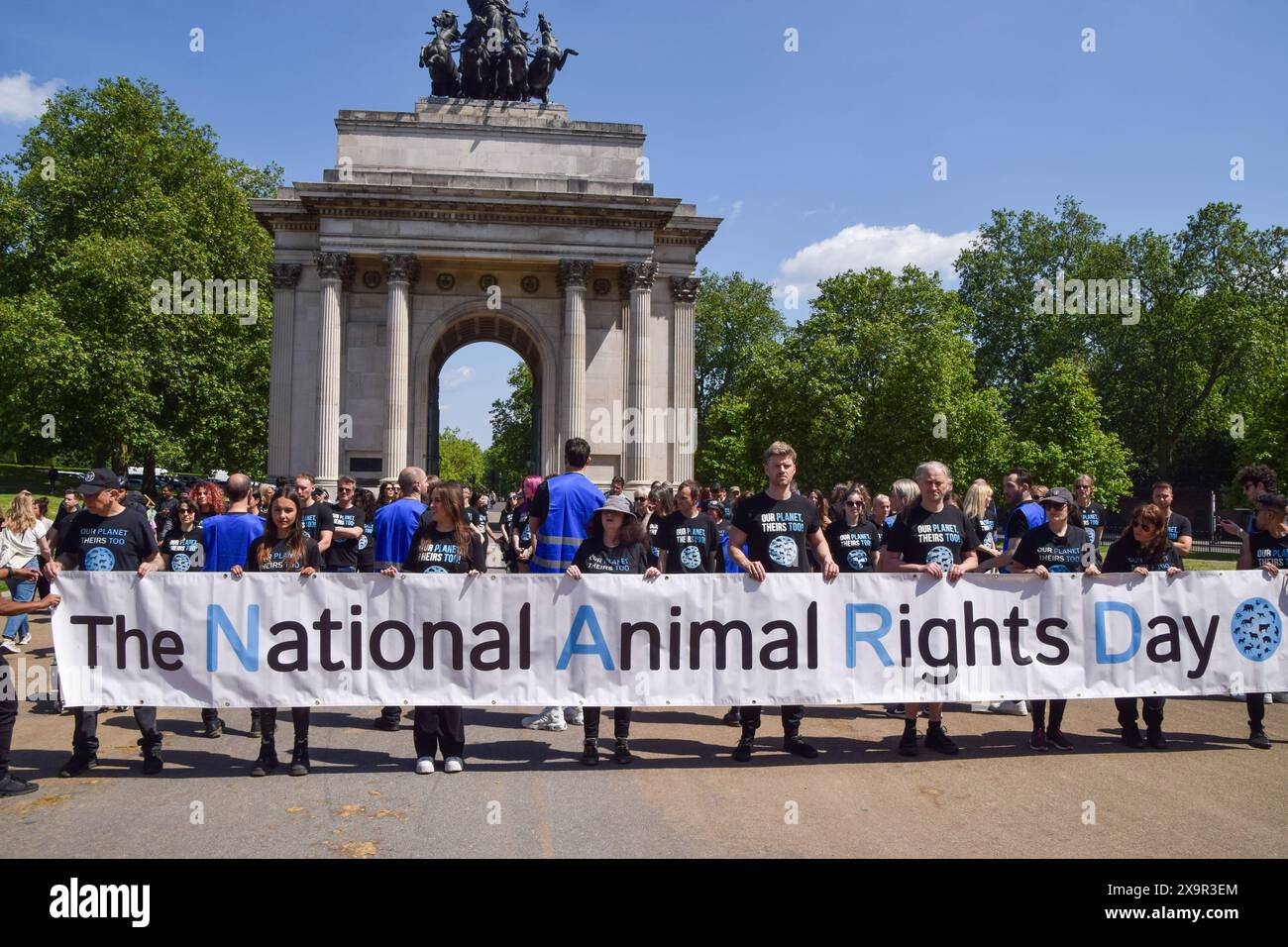London, UK. 2nd June 2024. Animal rights activists gather with pictures of animals next to the Wellington Arch at Hyde Park Corner for the National Animal Rights Day memorial. The annual event, taking place in numerous countries around the world, honours the billions of animals killed, abused and exploited by humans, and celebrates progress towards freedom for all species. Credit: Vuk Valcic/Alamy Live News Stock Photo