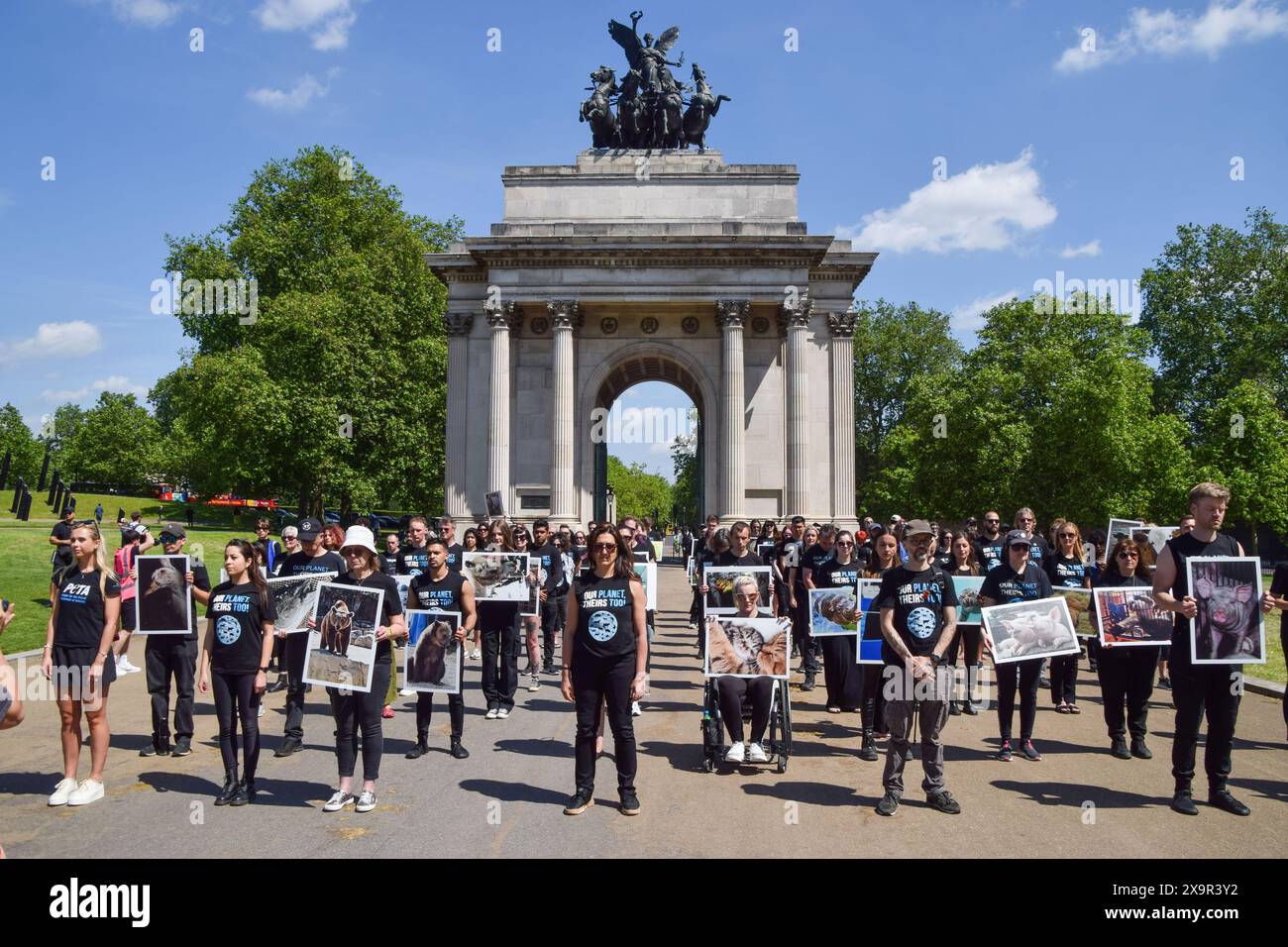 London, UK. 2nd June 2024. Animal rights activists gather with pictures of animals next to the Wellington Arch at Hyde Park Corner for the National Animal Rights Day memorial. The annual event, taking place in numerous countries around the world, honours the billions of animals killed, abused and exploited by humans, and celebrates progress towards freedom for all species. Credit: Vuk Valcic/Alamy Live News Stock Photo