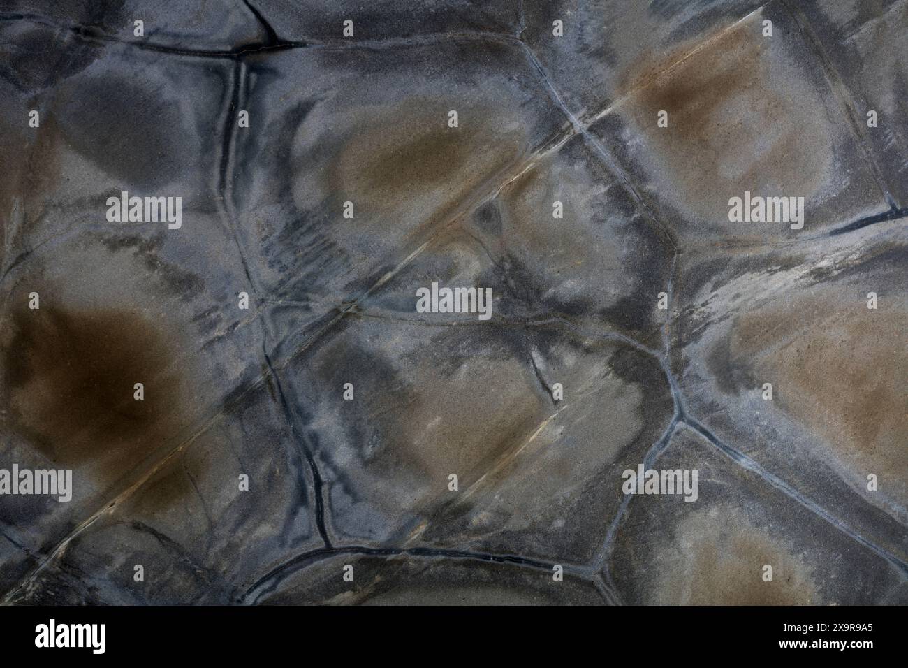 Quartzite background in your admirable grey color. Stock Photo