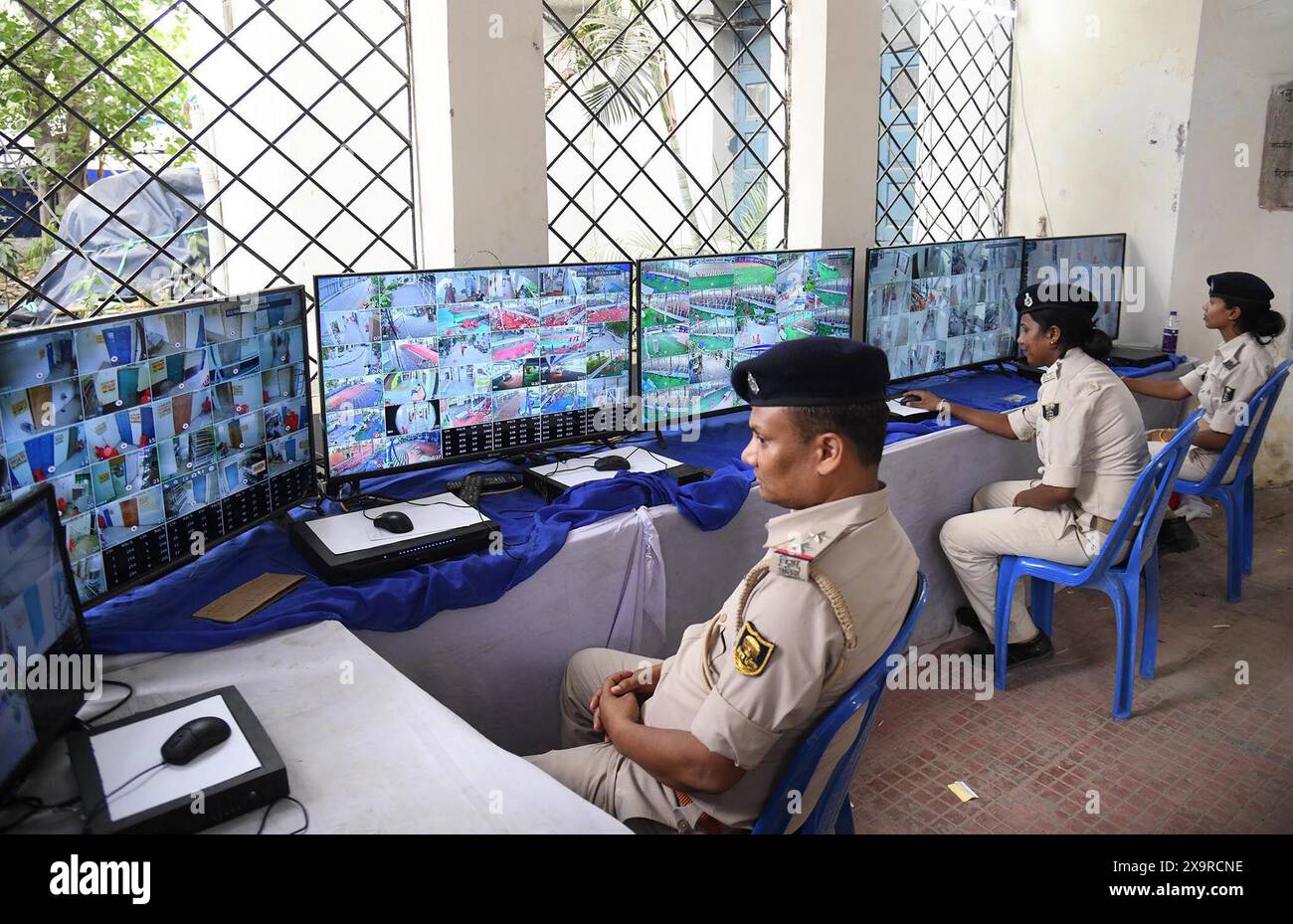 Patna, India. 02nd June, 2024. PATNA, INDIA - JUNE 2: Police personnel watching CCTV footage to monitoring strong room where Electronic Voting Machines (EVMs) kept after the seventh and last phase of Lok Sabha election at A.N. College on June 2, 2024 in Patna, India. (Photo by Santosh Kumar/Hindustan Times/Sipa USA ) Credit: Sipa USA/Alamy Live News Stock Photo