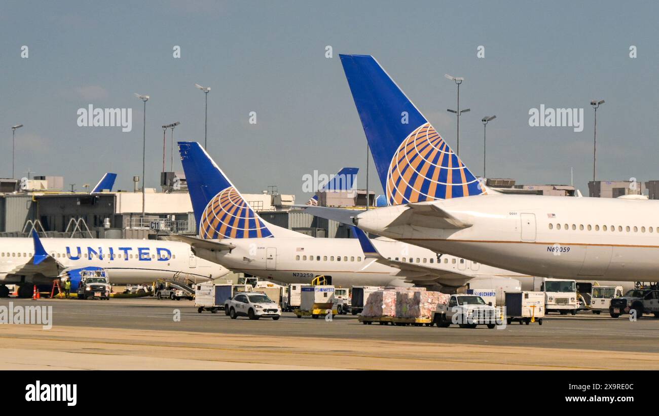 Washington DC, USA - 29 April 2024: Tail fins of United Airlnes aircraft at the terminal building at Dulles International airport Stock Photo