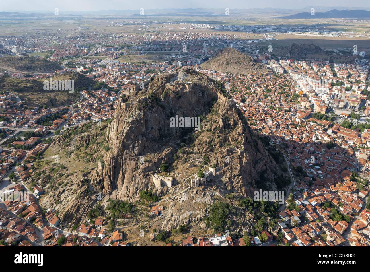 May 31, 2024: Afyonkarahisay, Turkey, June 1, 2024: Afyonkarahisar Castle, located on a volcanic rock mass at an altitude of 226 meters, was built by the Hittite Emperor II in 1350 BC. During the time of Mursil, it was used as a fortified position during the Arzava Expedition and was named Hapanuva. The castle was also the scene of important battles during the Byzantine and Seljuk periods. (Credit Image: © Tolga Ildun/ZUMA Press Wire) EDITORIAL USAGE ONLY! Not for Commercial USAGE! Stock Photo