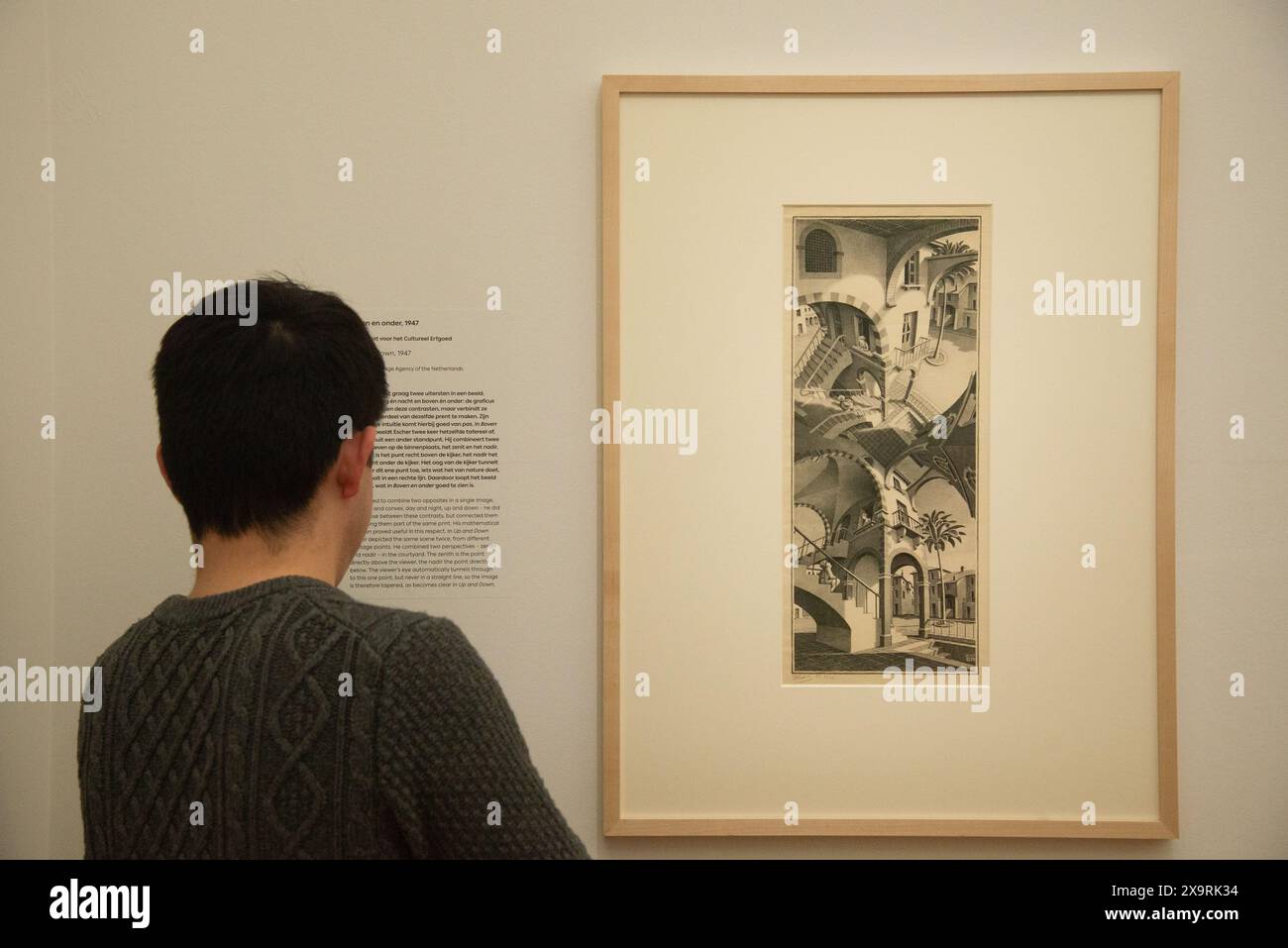 visitors at Escher exposition in museum in Den Haag, Holland Stock Photo