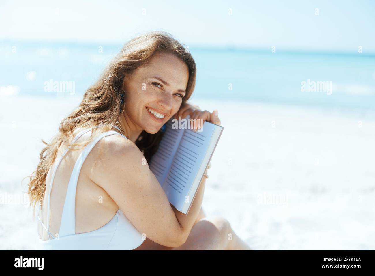 Woman book summer mature attractive hi-res stock photography and images ...