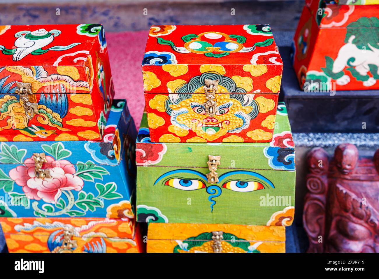 Colourful Tibetan style decorated boxes for sale as tourist souvenirs at the iconic Boudhanath