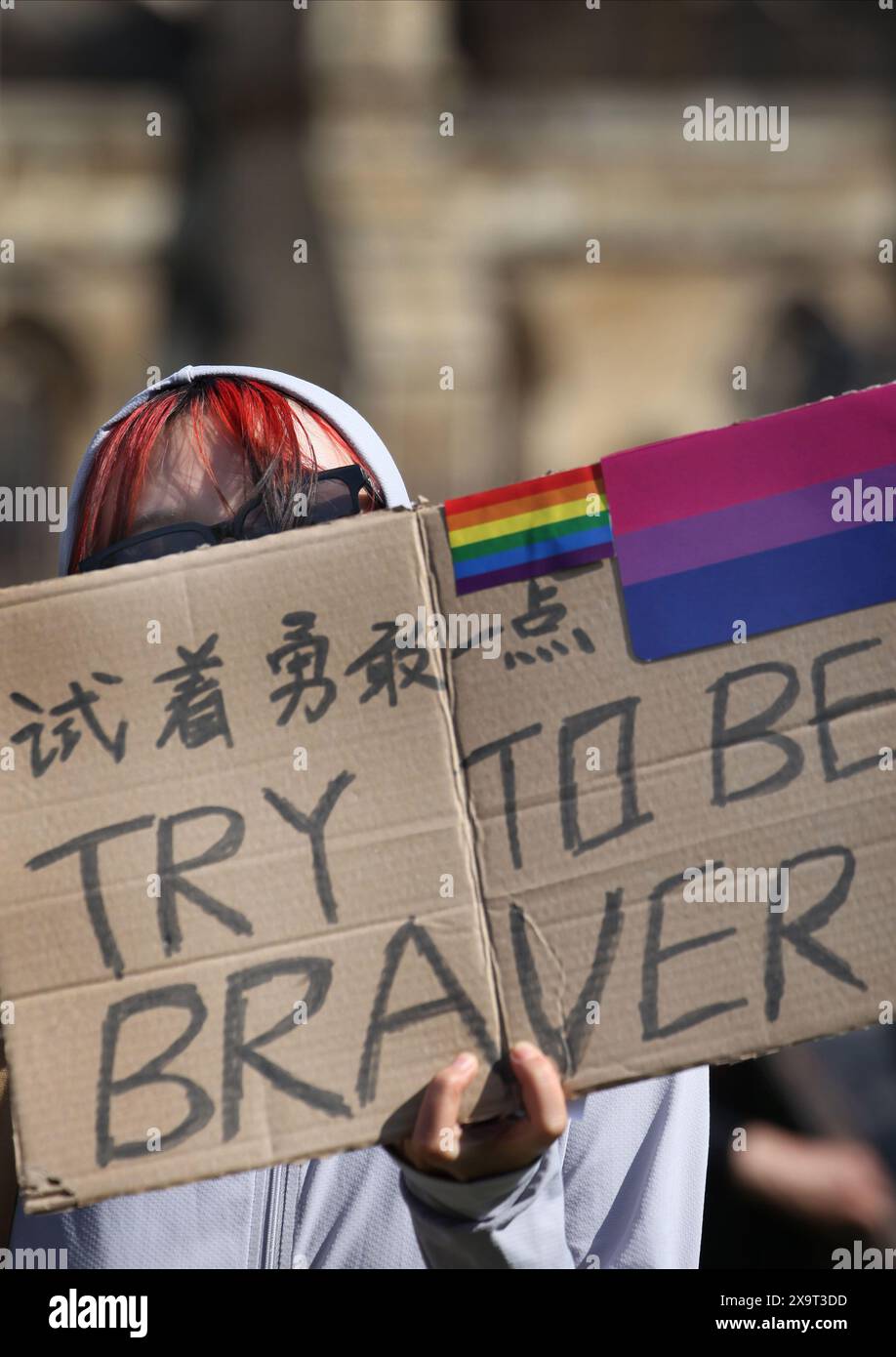 June 2, 2024, London, England, UK: A protester holds a sign saying ''˜Try To Be Braver' during the demonstration in Parliament Square. The event commemorated the1989 student-led protests and the Chinese government's bloody crackdown on 4 June, as well as protest against China's current clampdown on freedom of speech - including its increasing repression of Tibetans and Uyghurs, its crushing of dissent in Hong Kong, and the intimidation of Chinese and Hong Kong students in the UK, Europe and North America. Thirty-five years on, the Chinese authorities still ban information related to the Tian Stock Photo