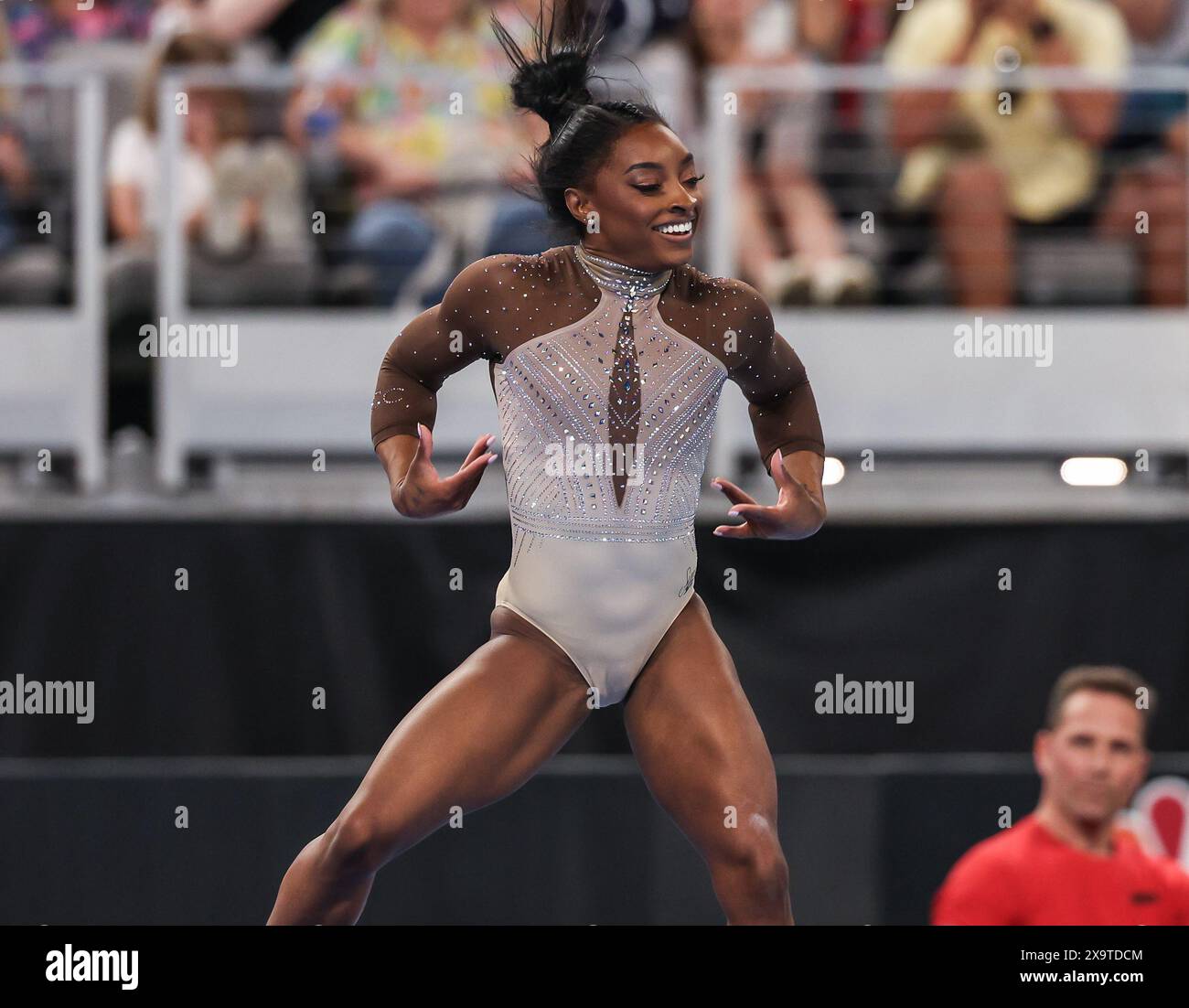 Fort Worth, Texas, USA. June 2, 2024: Simone Biles on the floor exercise as her coach Laurent Landi watches in the background during the Woman's Day 2 of the 2024 U.S. Gymnastics Championships at Dickies Arena in Fort Worth, TX. Kyle Okita/CSM Credit: Cal Sport Media/Alamy Live News Stock Photo