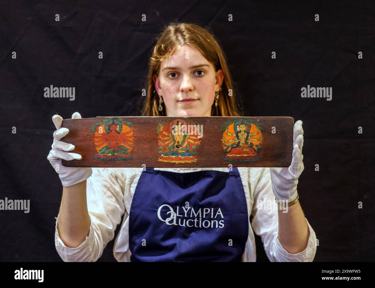 Olympia Auctions, London, UK. 03rd June, 2024. A pair of painted wood