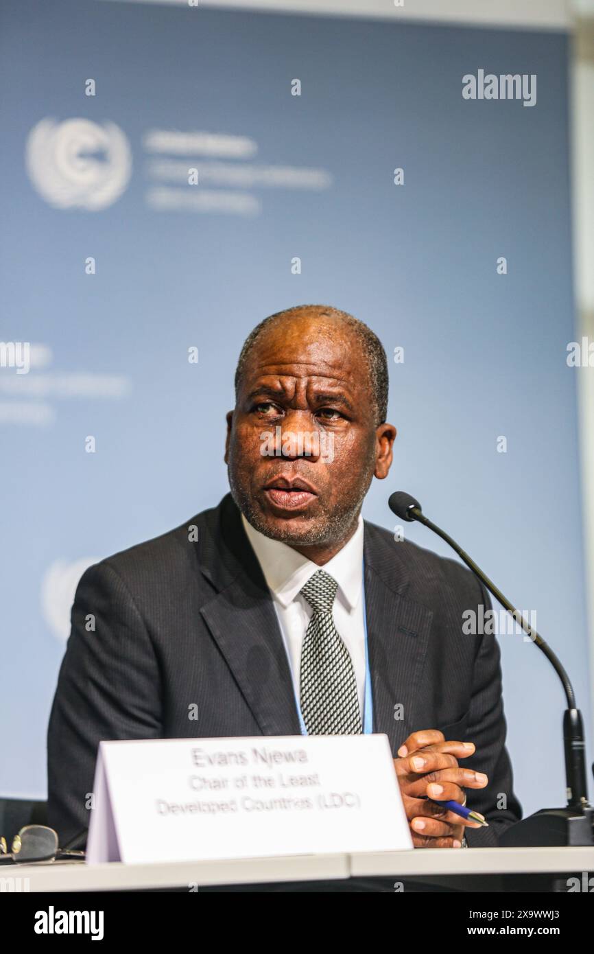 June 3, 2024, Bonn, Germany, Germany: EVANS NJEWA, Chair of the Least Developed Countries (LDC) speaks to the press on the first day of the United Nations Climate Change Conference 2024 in Bonn. Nations come together to address continuing problems and new issues arising within the global map of Climate change, addressing each nation and region on their perspective and unique problems to collective issues. Climate finance is new on the agenda, in which numbers of grants are dwindling while loan borrowing is increasing debt for some nations at risk. (Credit Image: © Bianca Otero/ZUMA Press Wire) Stock Photo