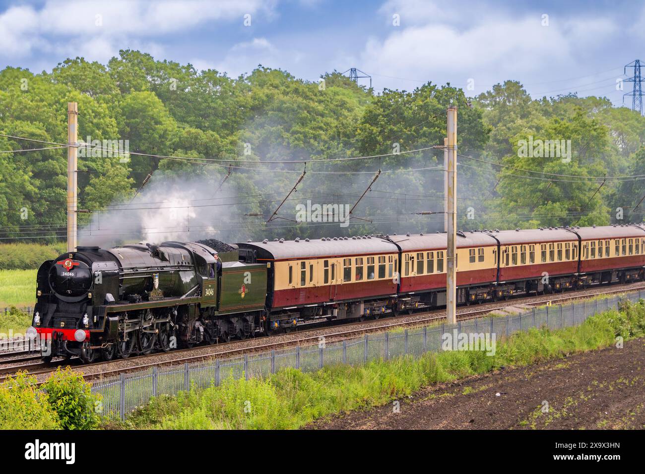 Heritage steam locmotive Braunton pictured here at Winwick on the West Coast main line. Braunton is an SR West Country class 21C146 engine. Stock Photo