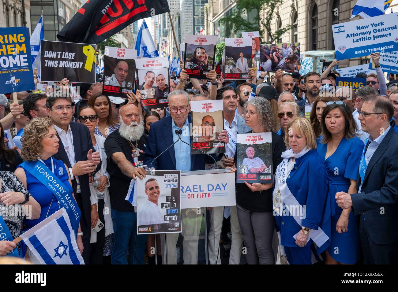 New York, New York, USA. 2nd June, 2024. (NEW) The 2024 Celebrate Israel Parade. June 02, 2024, New York, New York, USA: Senate Majority Leader, U.S. Senator Chuck Schumer (C) speaks to media at the start the annual Celebrate Israel Parade on June 2, 2024 in New York City. Tens of thousands of people marched up Fifth Avenue during a parade for Israel, with many calling for the release of hostages held by Hamas in Gaza, &quot;Bring Them Home,&quot; a message that rang loud and clear. The parade came almost eight months after the unprecedented Oct. 7 attack by Hamas, the deadliest in Isr Stock Photo