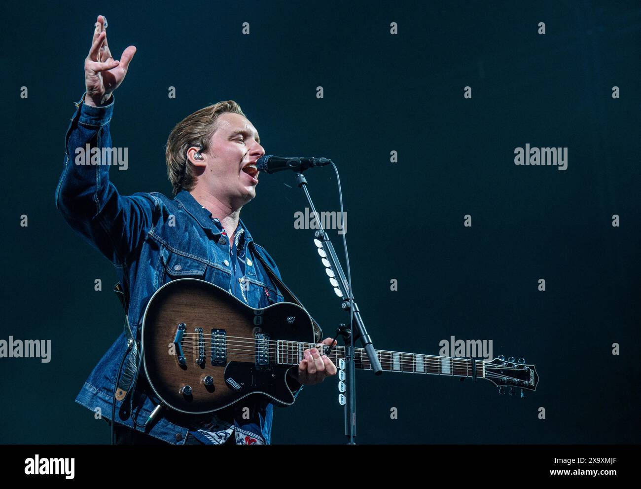 George Ezra playing live in front of thousands of very excited fans at the Latitude Festival at Henham Park in Suffolk. Stock Photo