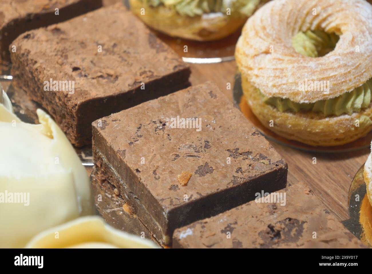 Enjoy a variety of chocolates and pastries to satisfy your sweet cravings with gourmet desserts Stock Photo