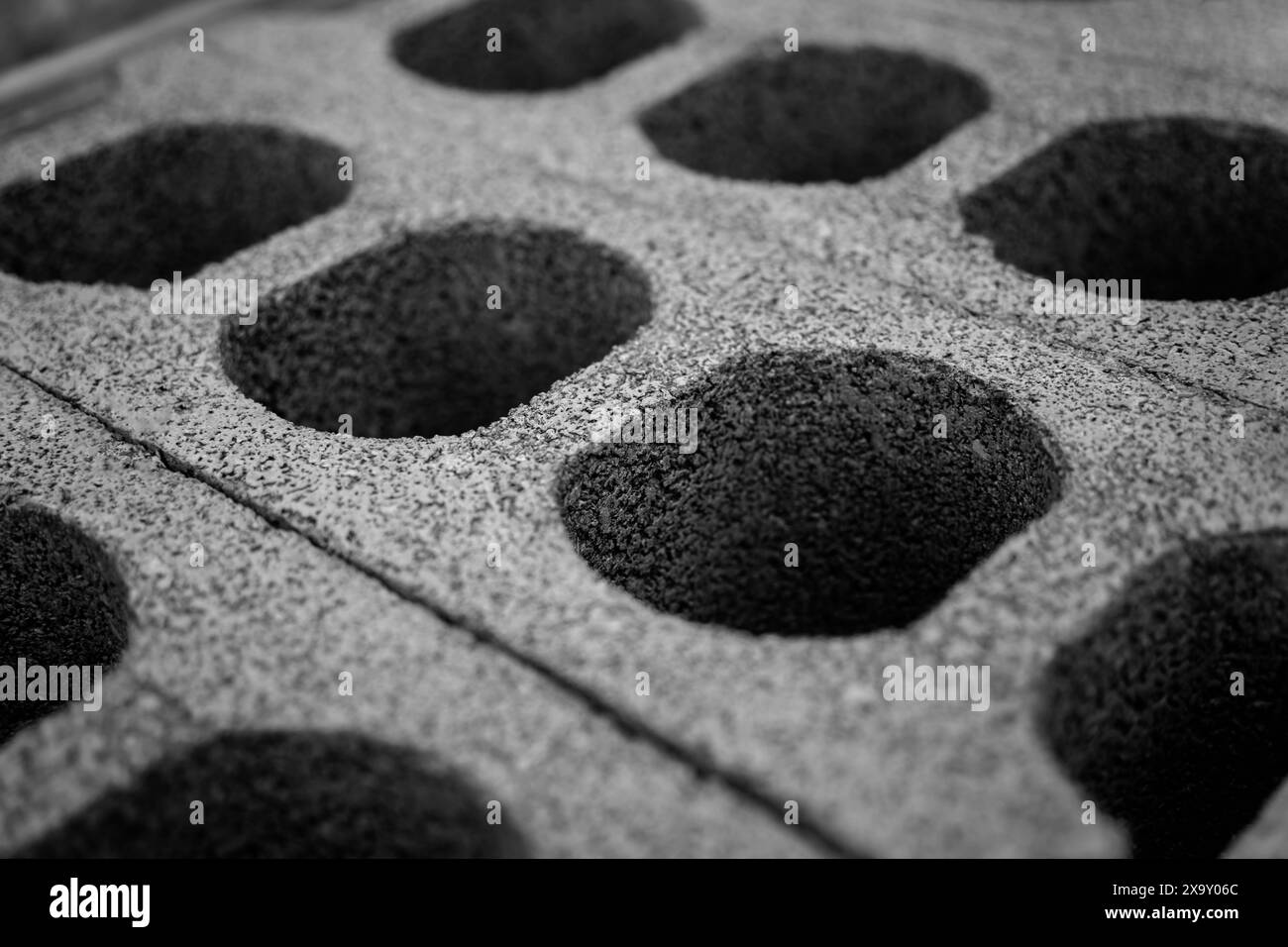 Concrete blocks with holes stacked on top of each other Stock Photo