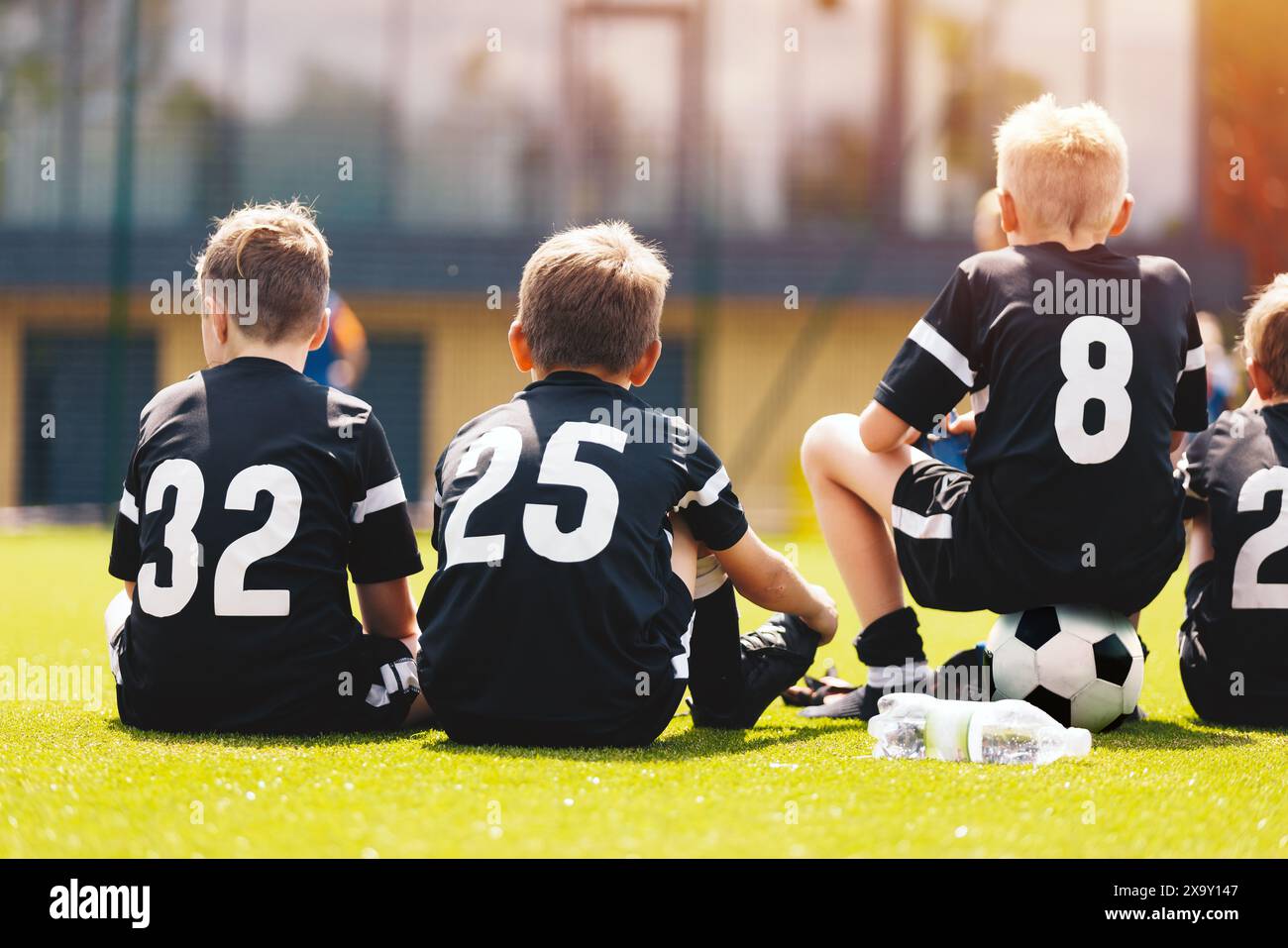 boys-in-football-team-children-play-match-in-youth-soccer-league