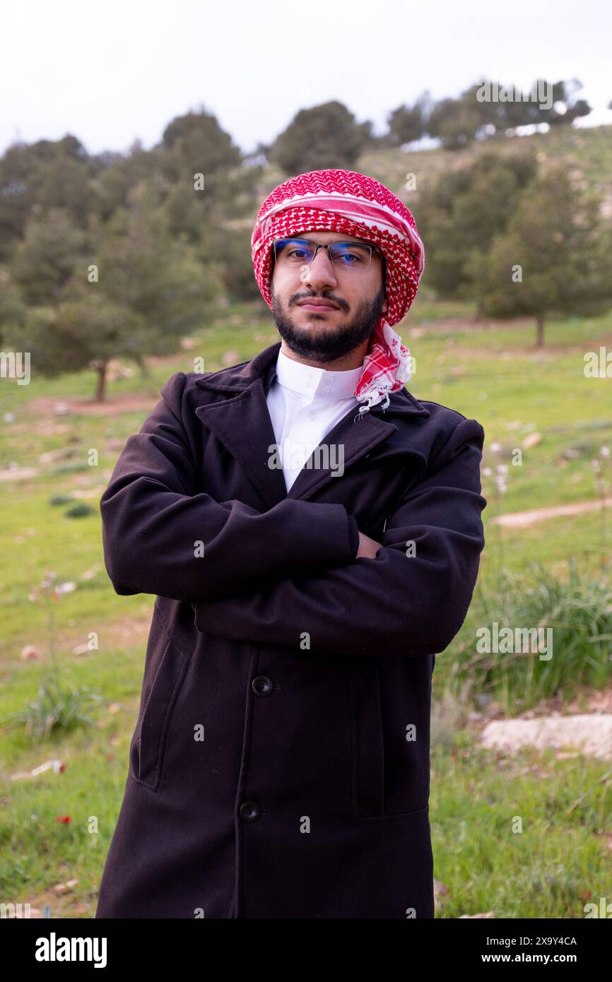 Arab Man Tree An Arab man in nature clears his mind and thinks positively about the ...