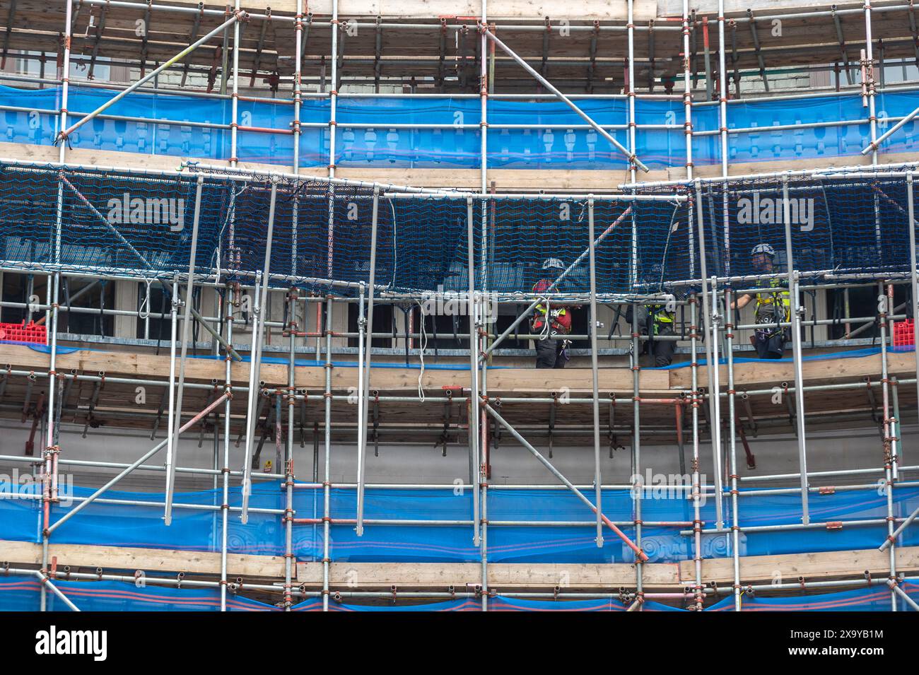 London, UK.  3 June 2024.  Blue tarpaulin that recently covered the exterior scaffolding (including a giant IKEA shopping bag) surrounding the former Top Shop flagship at Oxford Circus, has been removed.  IKEA is planning to open an inner-city store in 2025.  Commentators have said that Oxford Street, once Europe’s busiest shopping street, is in need of a much-needed boost.  Credit: Stephen Chung / Alamy Live News Stock Photo