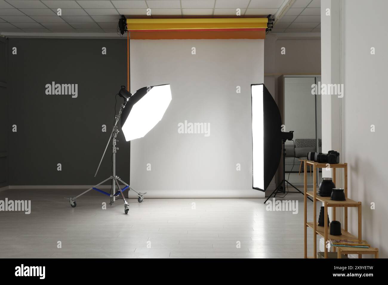 Empty photo studio with lighting equipment Stock Photo - Alamy