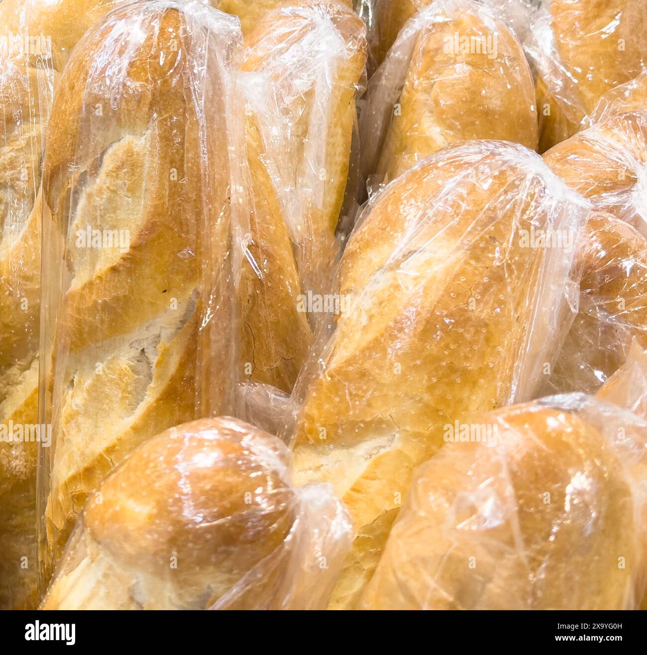 Buns in wicker basket. Composition with bread and rolls Stock Photo