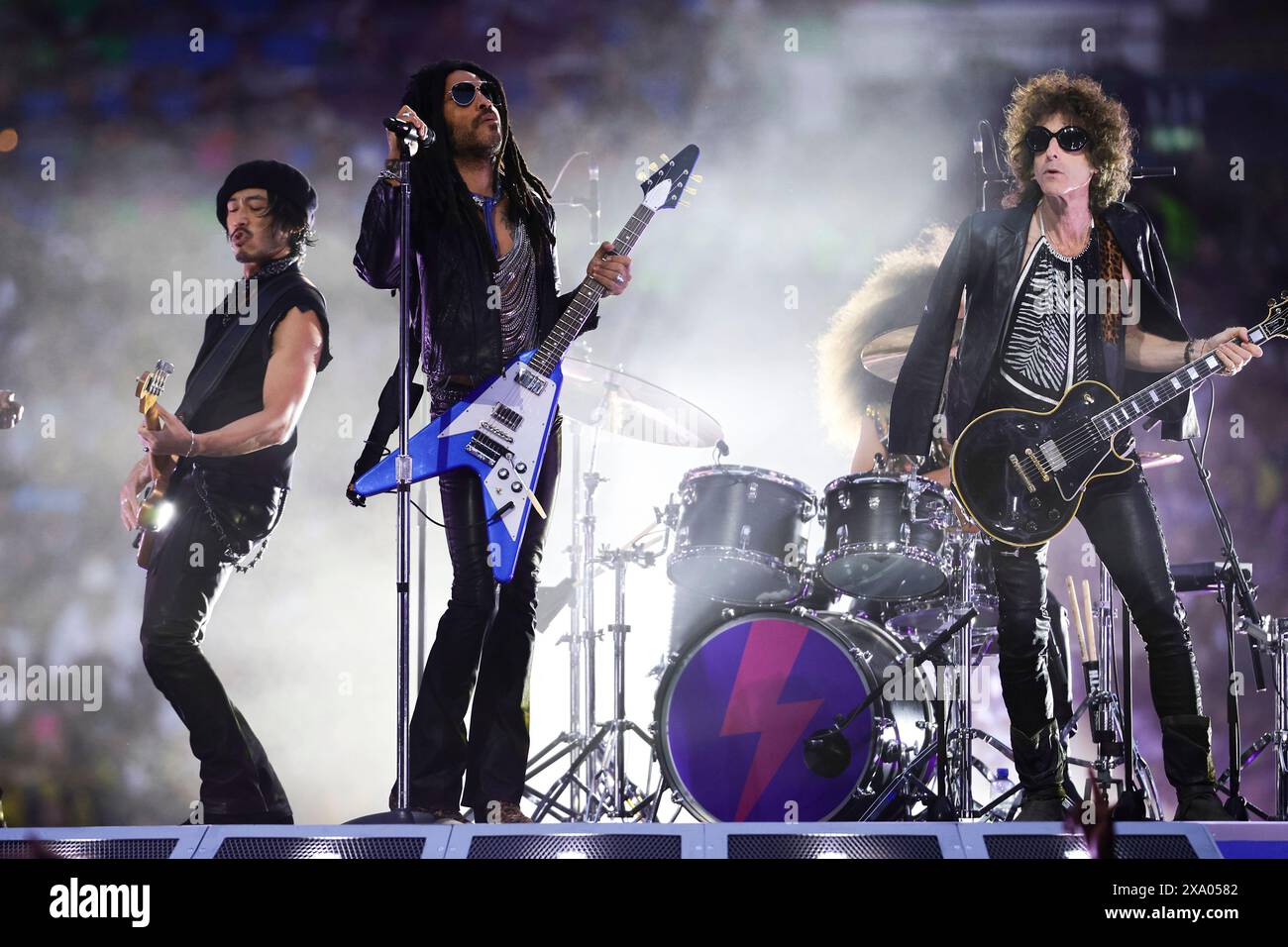 Lenny Kravitz performs with his band prior to the 2023/2024 Champions