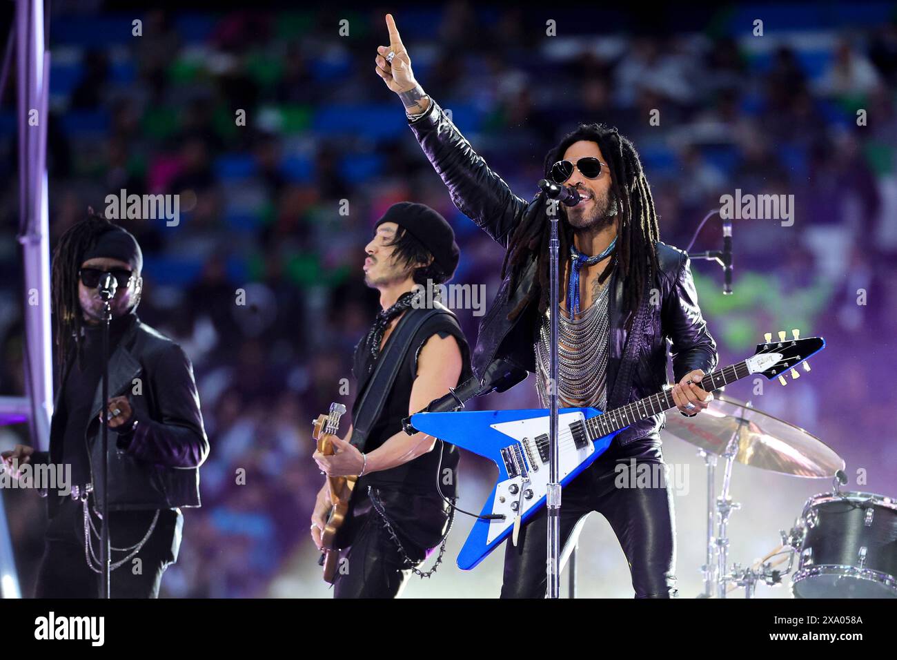 Lenny Kravitz performs with his band prior to the 2023/2024 Champions