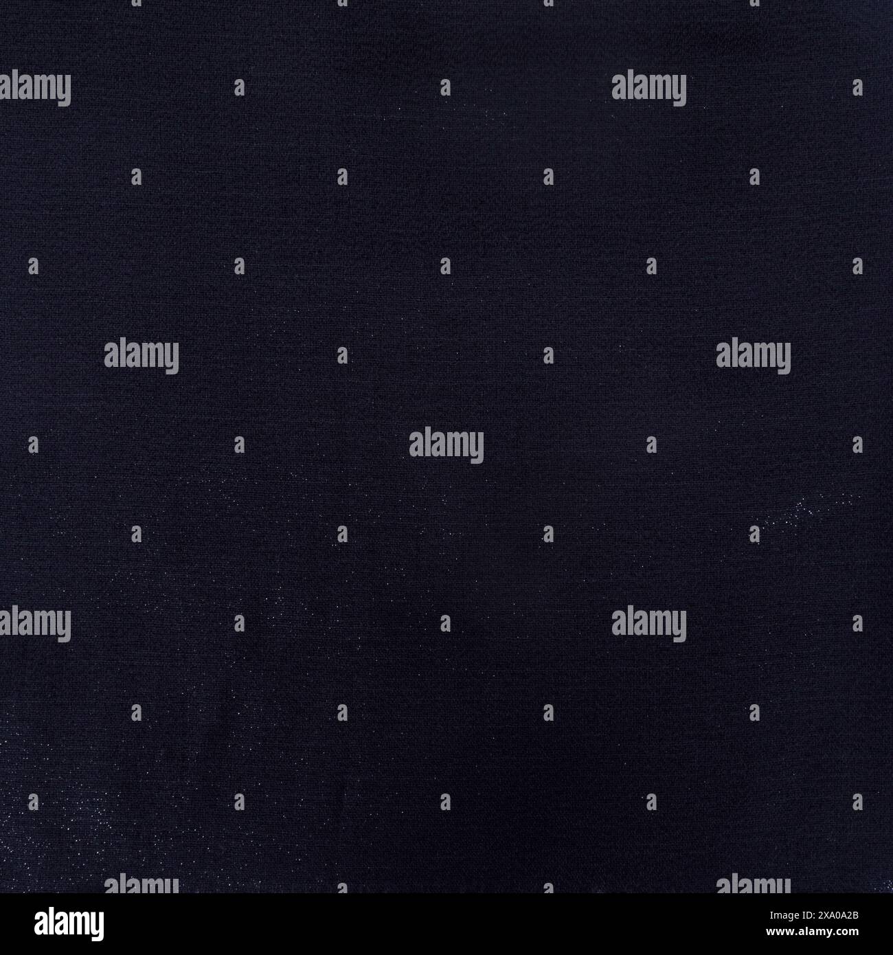 Smooth thin shiny lurex fabric texture. Black background Stock Photo