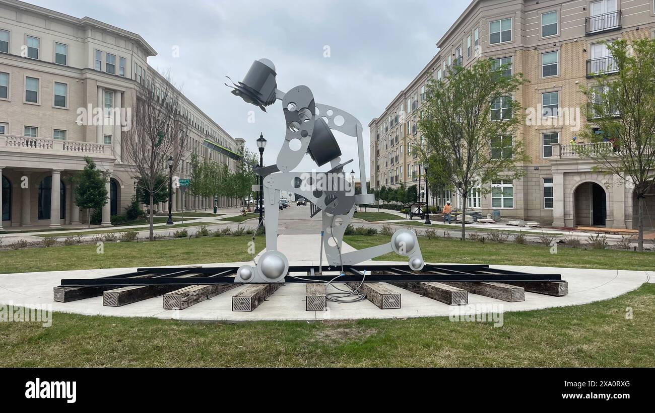 An abstract concrete block statue in front of a hotel Stock Photo