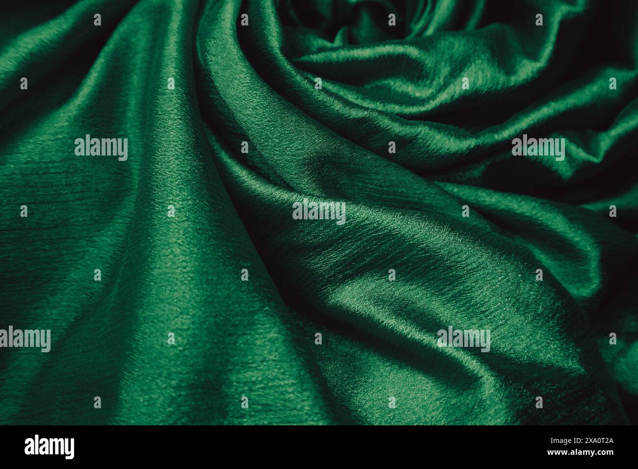 A green silk fabric background Stock Photo