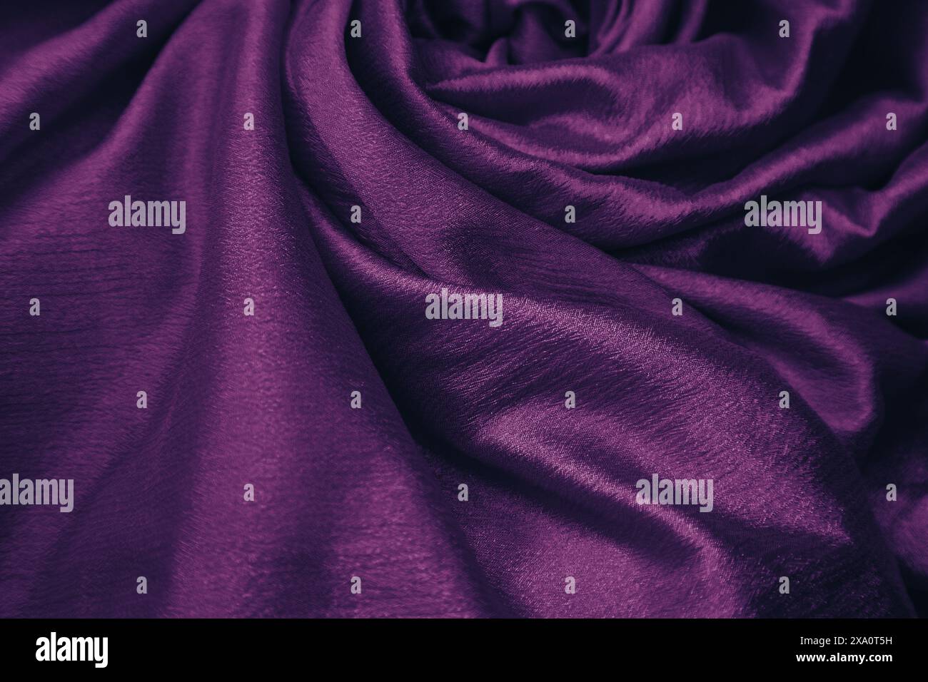A purple silk fabric background Stock Photo
