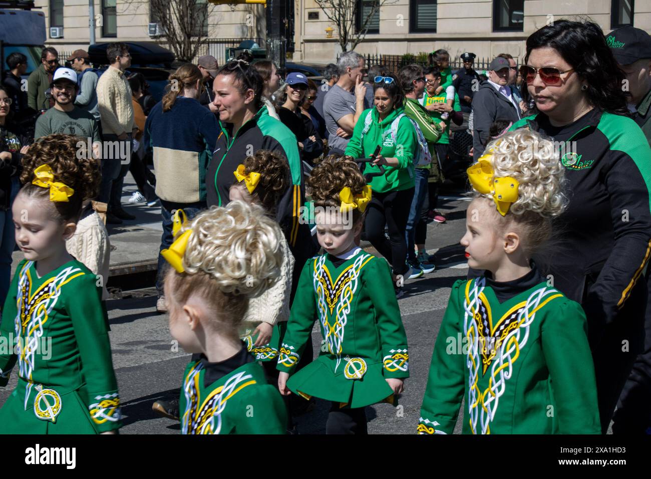 A bustling street parade with a big crowd gathered in New York, United ...