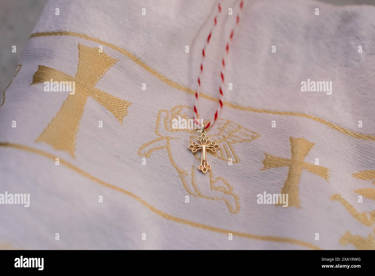 Christening cross hi-res stock photography and images - Alamy, image size:1300x957