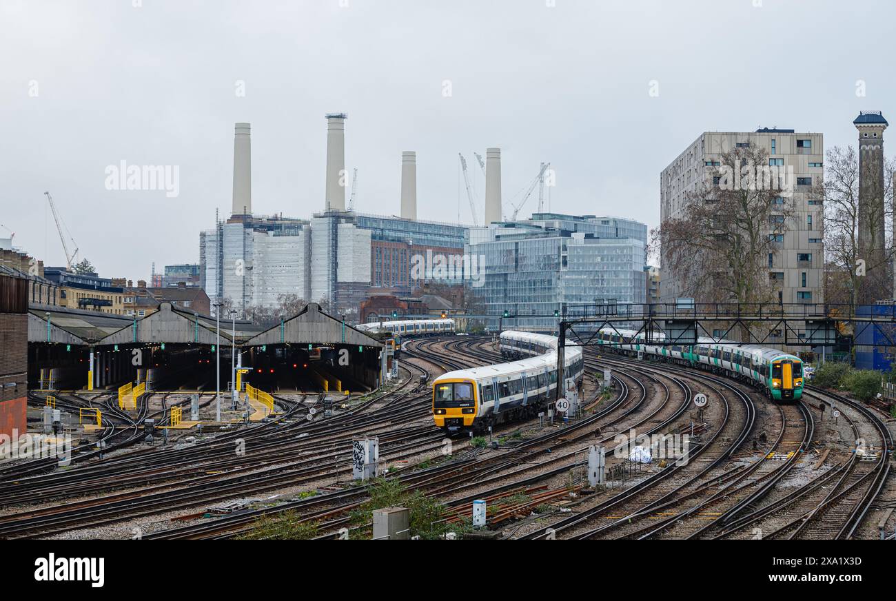 A train passed through the Battersea Power Plant Stock Photo