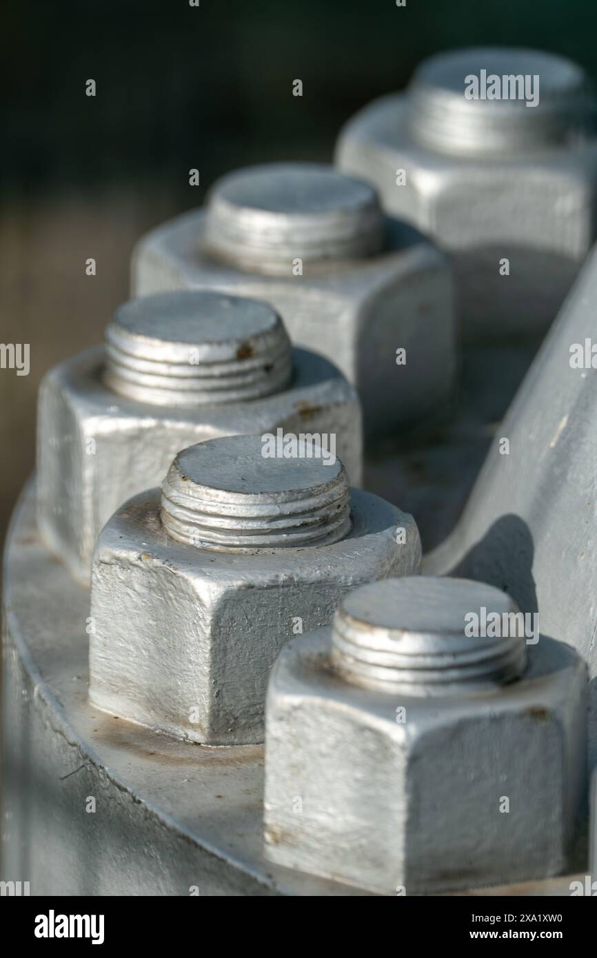 Close up of big nuts and bolts painted in silver Stock Photo