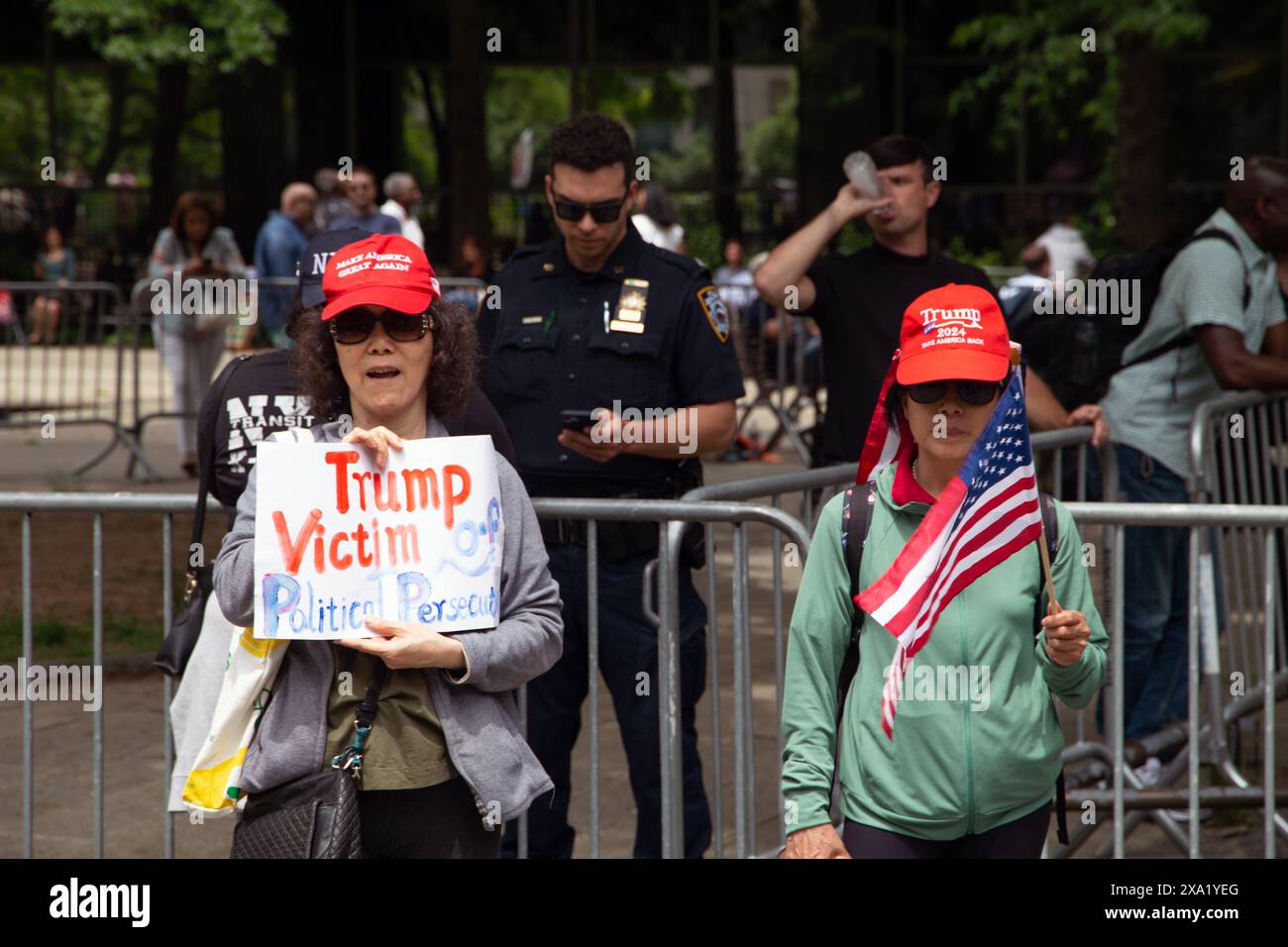 Protestors outside of the Donald J Trump hush money trial in New York
