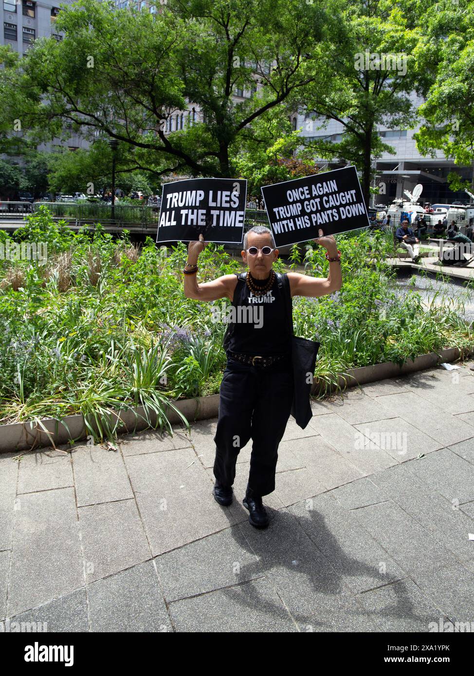 Protestors outside of the Donald J Trump hush money trial in New York