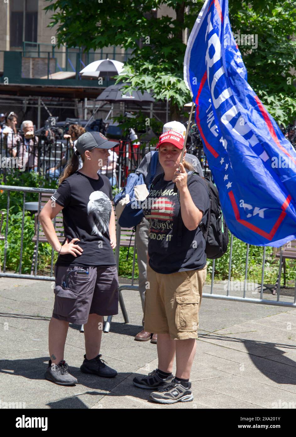 Protestors outside of the Donald J Trump hush money trial in New York