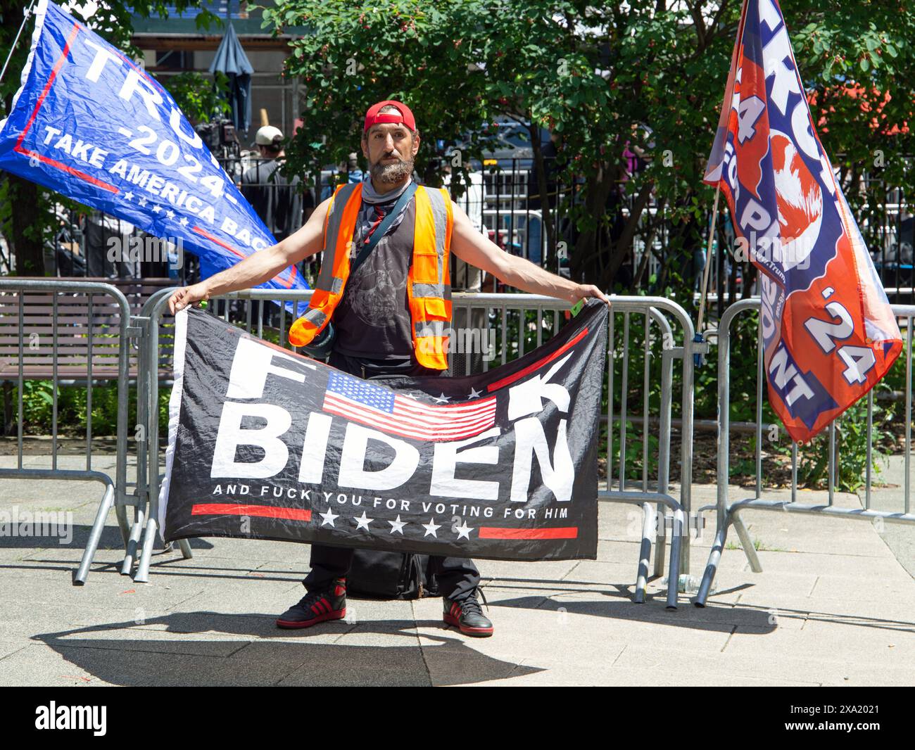 Protestors outside of the Donald J Trump hush money trial in New York