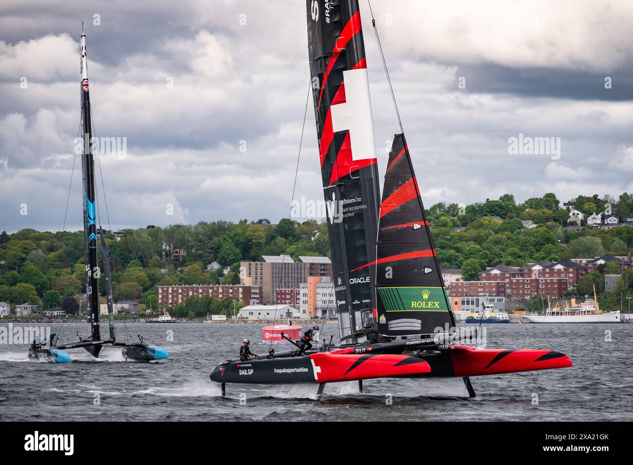 Teams from Switzerland and New Zealand during the June 2024 Sail GP event in Halifax, Nova