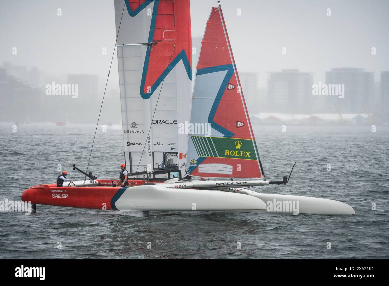 Team Canada sails a close pass of the waterfront and crowd during the June 2024 Sail GP event in