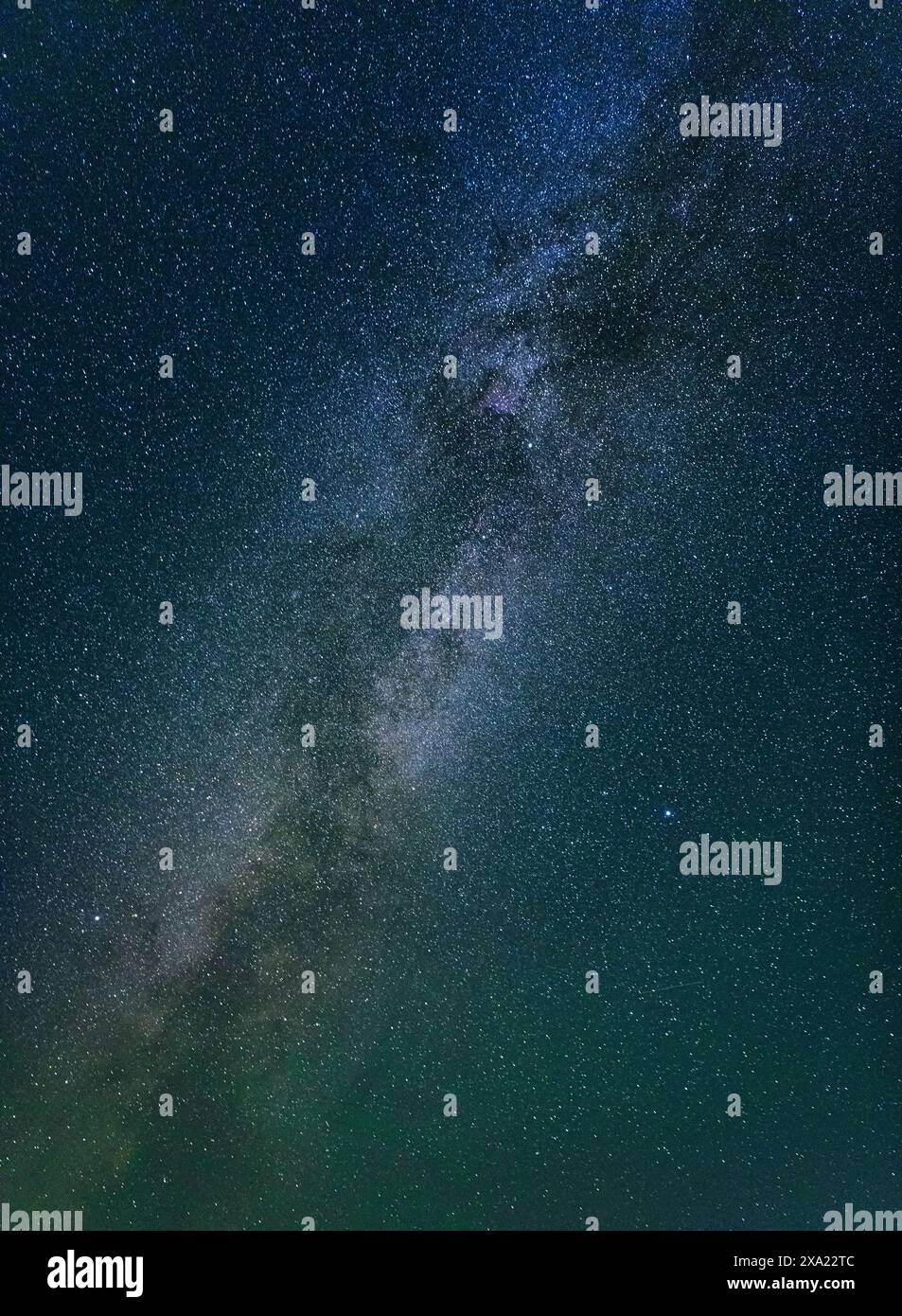 A scenic view of the Milky Way galaxy in a starry night sky Stock Photo ...