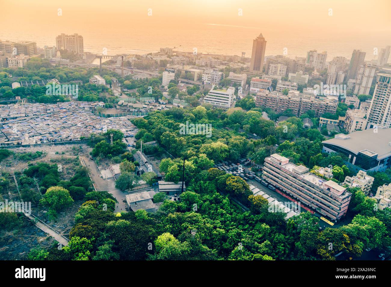 The Aerial view of the Mumbai city skyline at sunset with glowing light Stock Photo