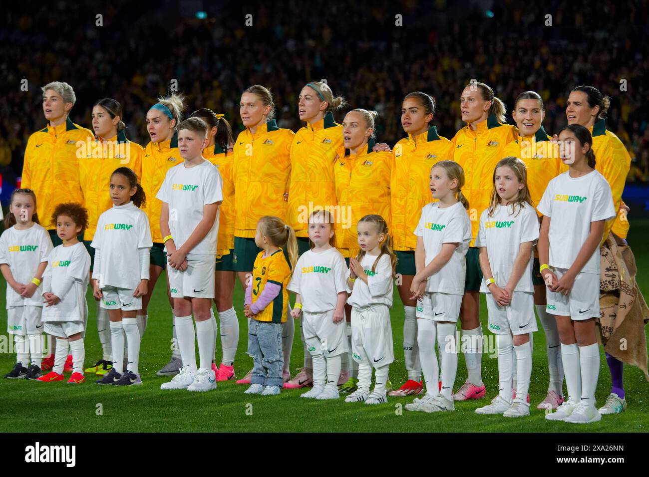 Sydney, Australia. 03rd June, 2024. Australian Players line up for the National Anthem before the international friendly match between Australia and China PR at Accor Stadium on June 3, 2024 in Sydney, Australia Credit: IOIO IMAGES/Alamy Live News Stock Photo