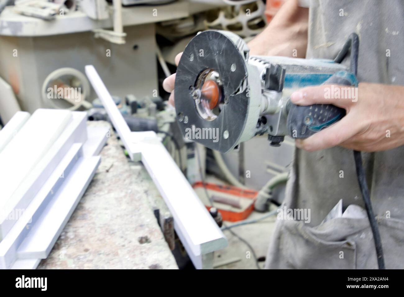 A Carpenter working in his studio Stock Photo